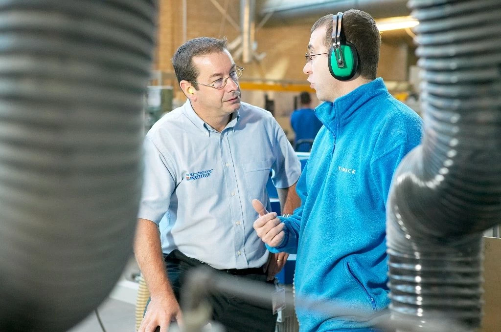 Manufacturing Practitioner Bill Tiplady (pictured left) providing advice to a customer