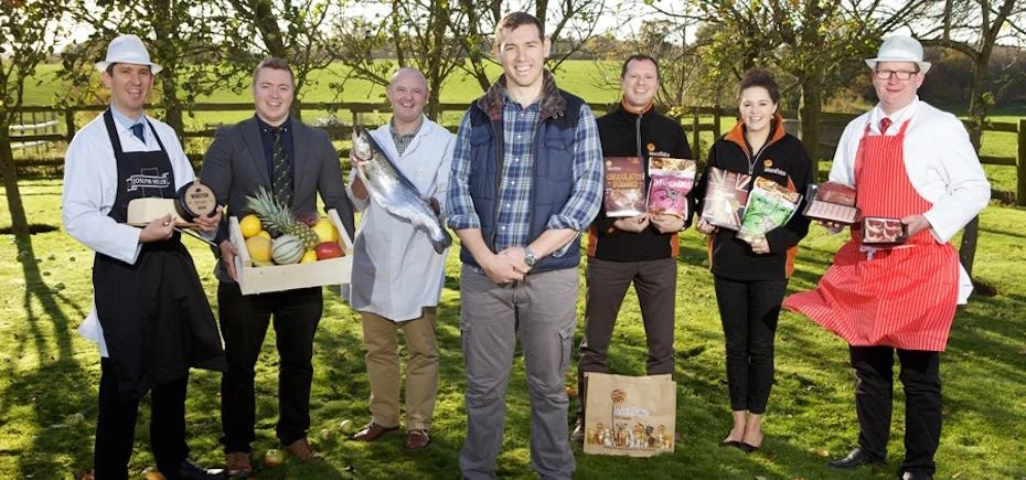 MD Philip Edge (centre) with Bearfaced Groceries' partners and suppliers