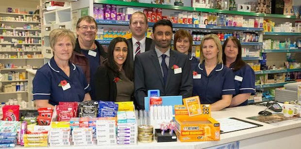 Pete Johal with  Graham Harper  and the rest of the team at Calow Pharmacy