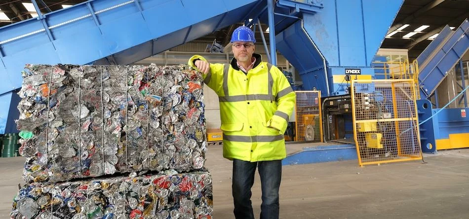 Gareth Godwin, Manager at Ward Recycling, with a bale of recycled cans