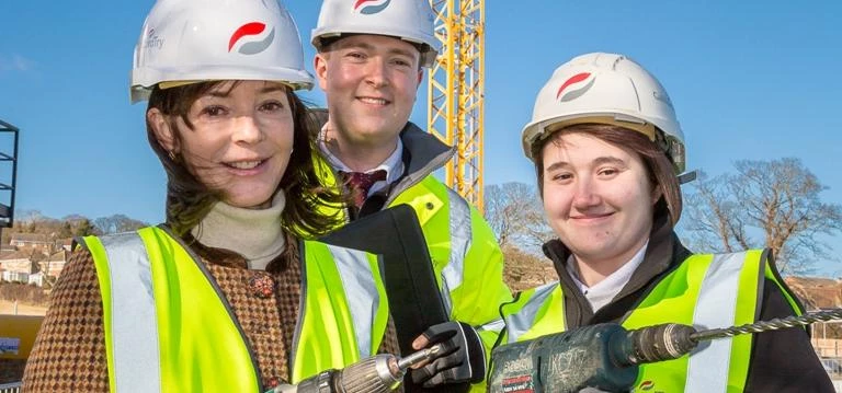 The Duchess learning the drill from newly qualified joiner, Claire Shiells and graduate trainee site