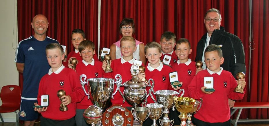 Phil Handley (back right) with youngsters from Cotsford Junior School, Miss Jones (Head Teacher) and