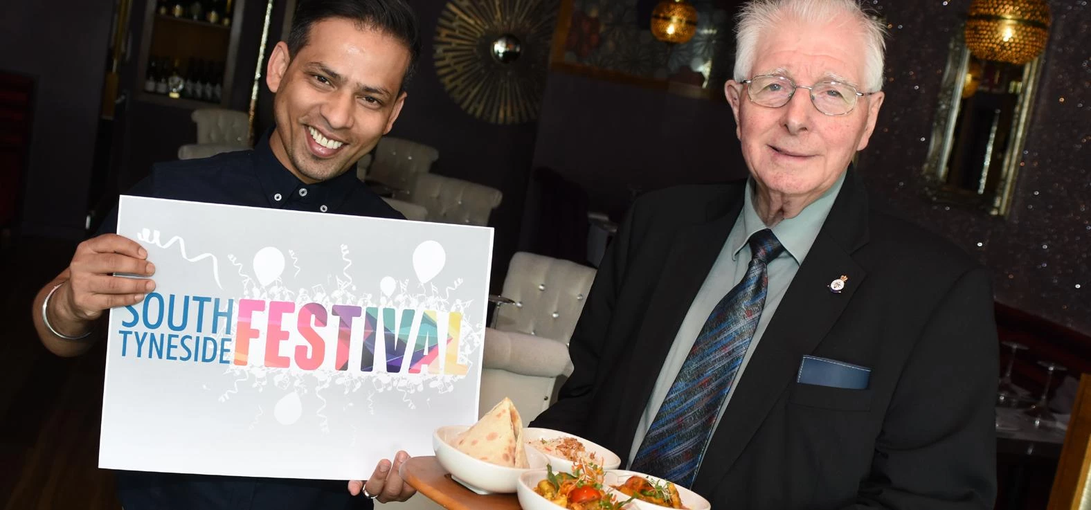 Shah Choudhury of Zeera Indian Cuisine with Councillor Alan Kerr, Deputy Leader of South Tyneside Co