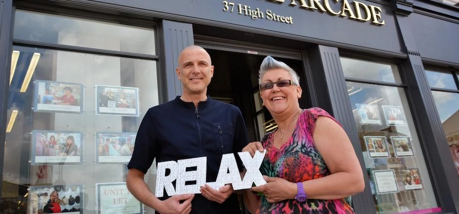 Business owner and massage therapist Andy Allum (left)