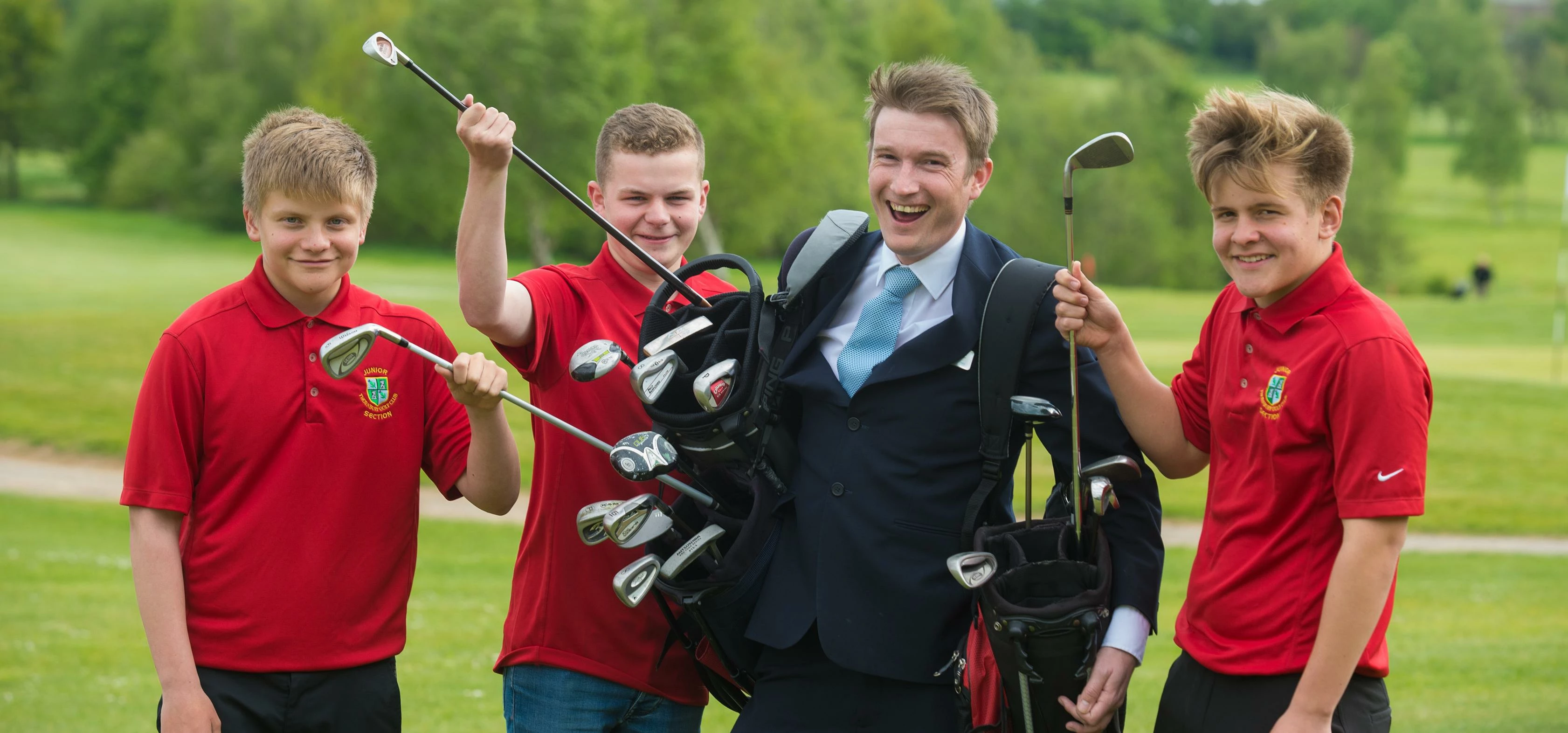 Jurgen Bowering from David Wilson Homes with young golfers, Alex Hall, Sam Ballard and Dan Ballard