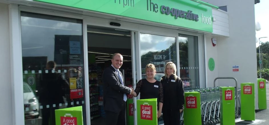 Tim Aisbitt of Bradley Hall with Co-op staff at new Bedlington store