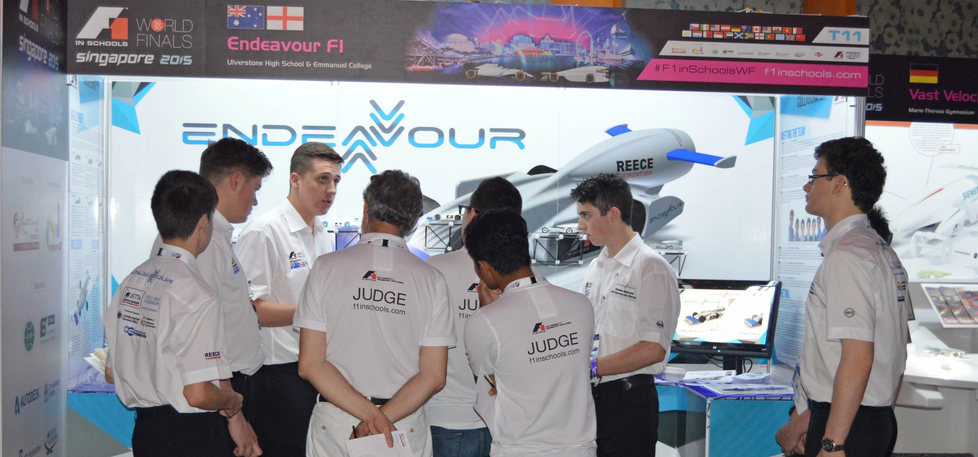 James Rodger (third from left) explains the Emmanuel College’s team concept to judges at the F1 in S
