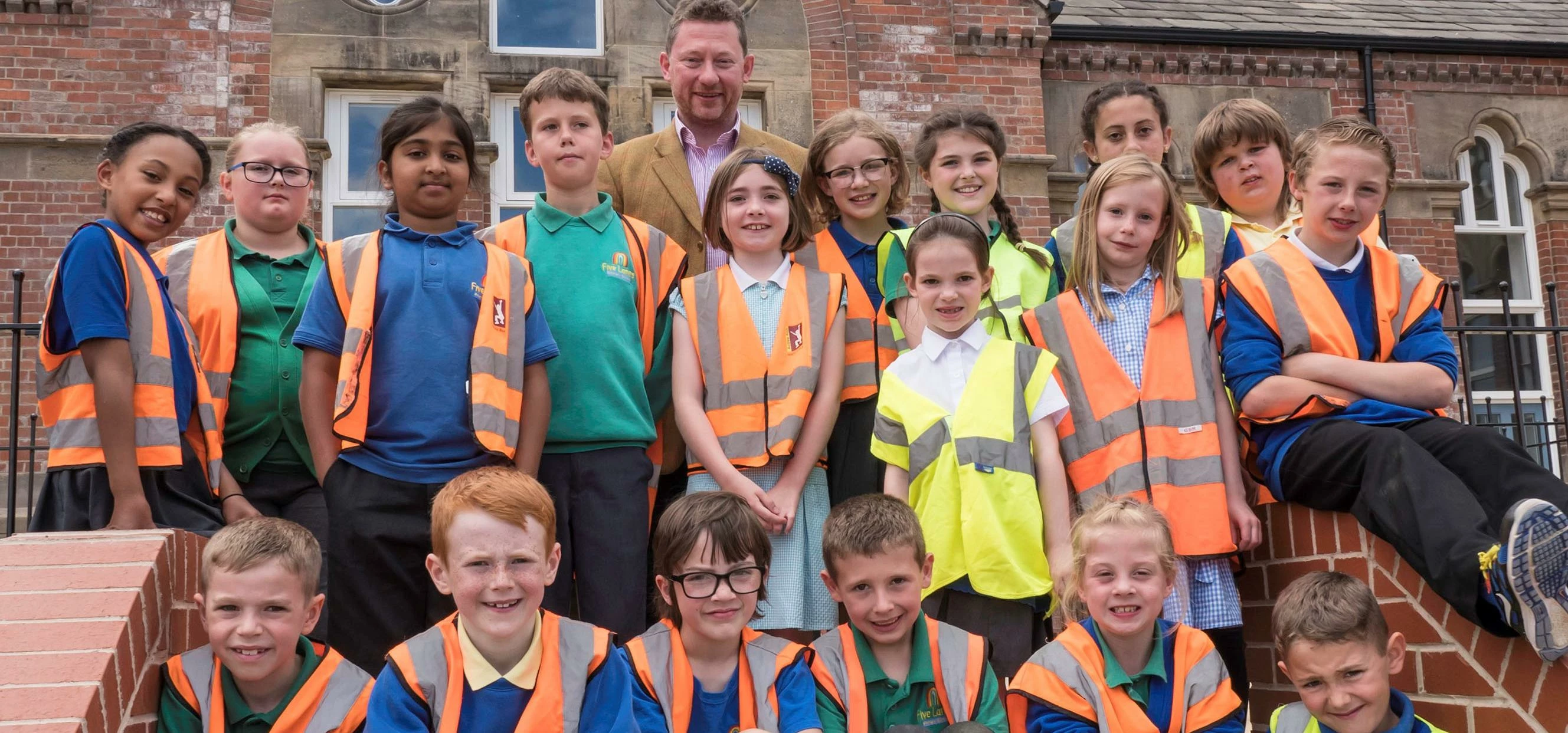 Tim Reeve from Advent Developments with pupils from Five Lanes Primary School