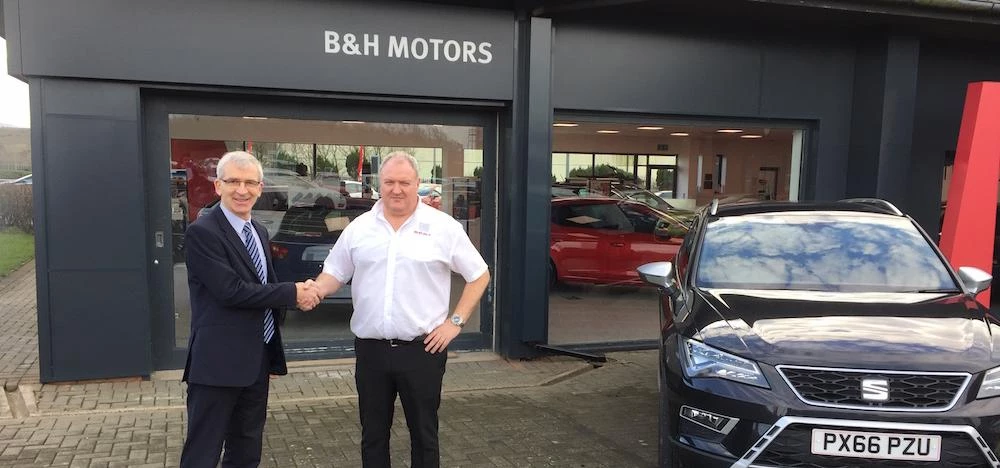 Simon Campbell of Clydesdale Bank (left) with B+H Motors boss Geoff Moore