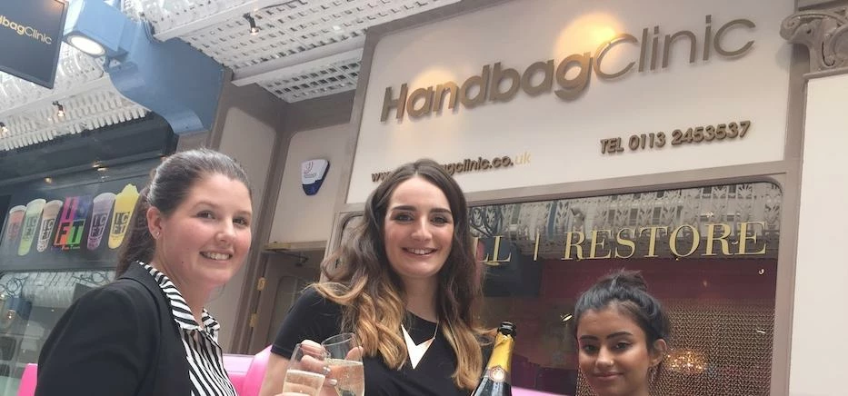Handbag Clinic staff members Amber Reeve, Vicky Owen and Nayha Faris.
