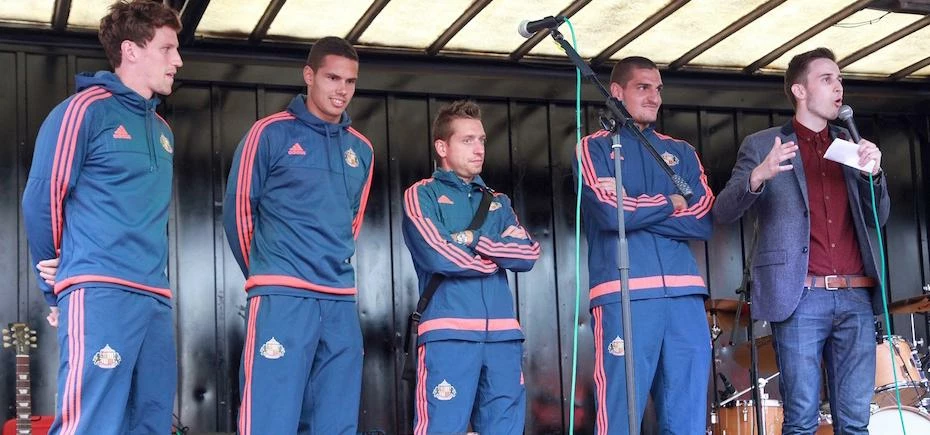The Sunderland players with Thomas Hannett (right) assistant producer at Global Radio