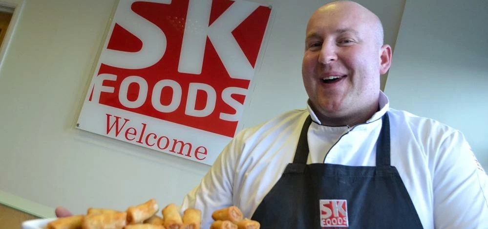 Marek Blonski with just some of the spring rolls made by SK Foods