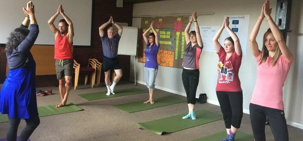 Palvinder teaching yoga at Christeyns