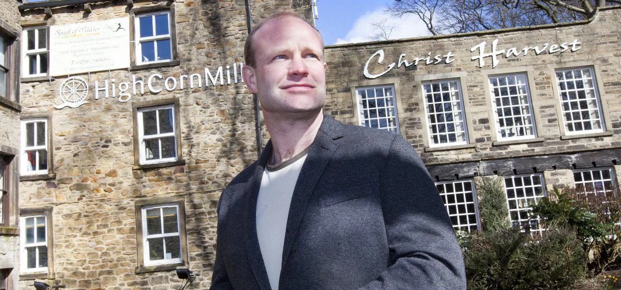 Andrew Mear outside one of his properties, High Corn Mill