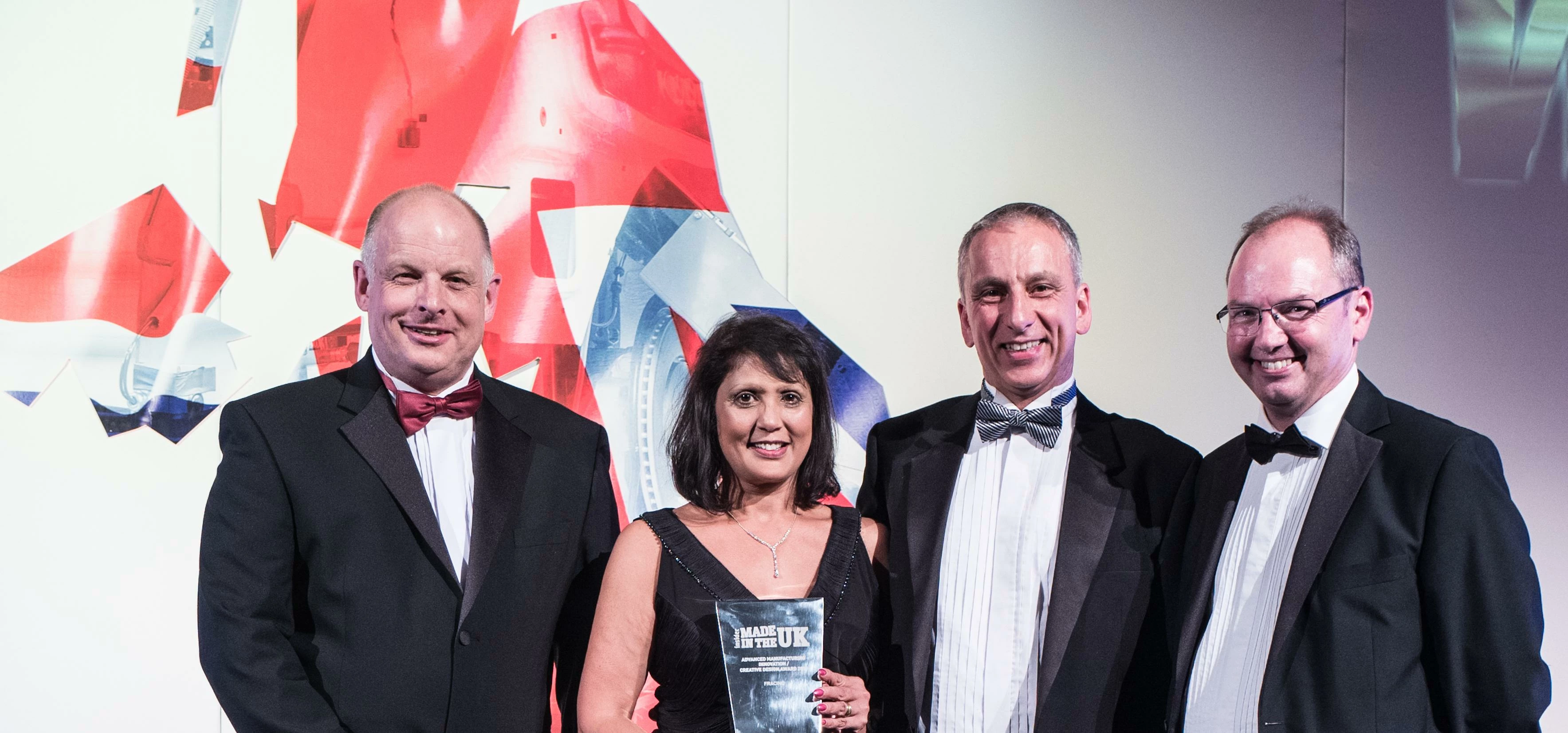 Savouring national recognition: l to r Peter Atmore, Marion and Adrian Maxwell with Peter Roberts of