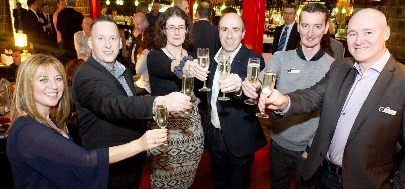 The Alexander Knight & Co team celebrates a successful two years in business 