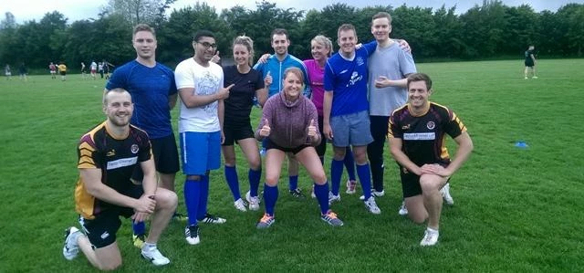 Taylor&Emmet's touch rugby team with Tigers players, Peter Swatkins (left) and Tom Outram (right). 