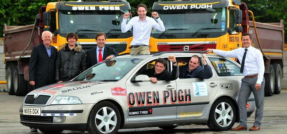 PHOTO CAPTION: Joe Brain (centre, on top of car) with (from left to right): Robin Armstrong of Owen