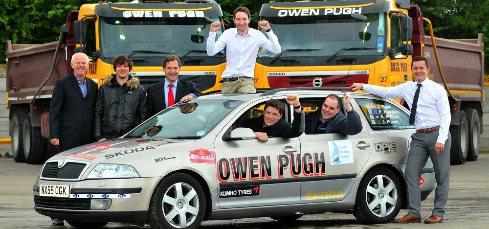 PHOTO CAPTION: Joe Brain (centre, on top of car) with (from left to right): Robin Armstrong of Owen 