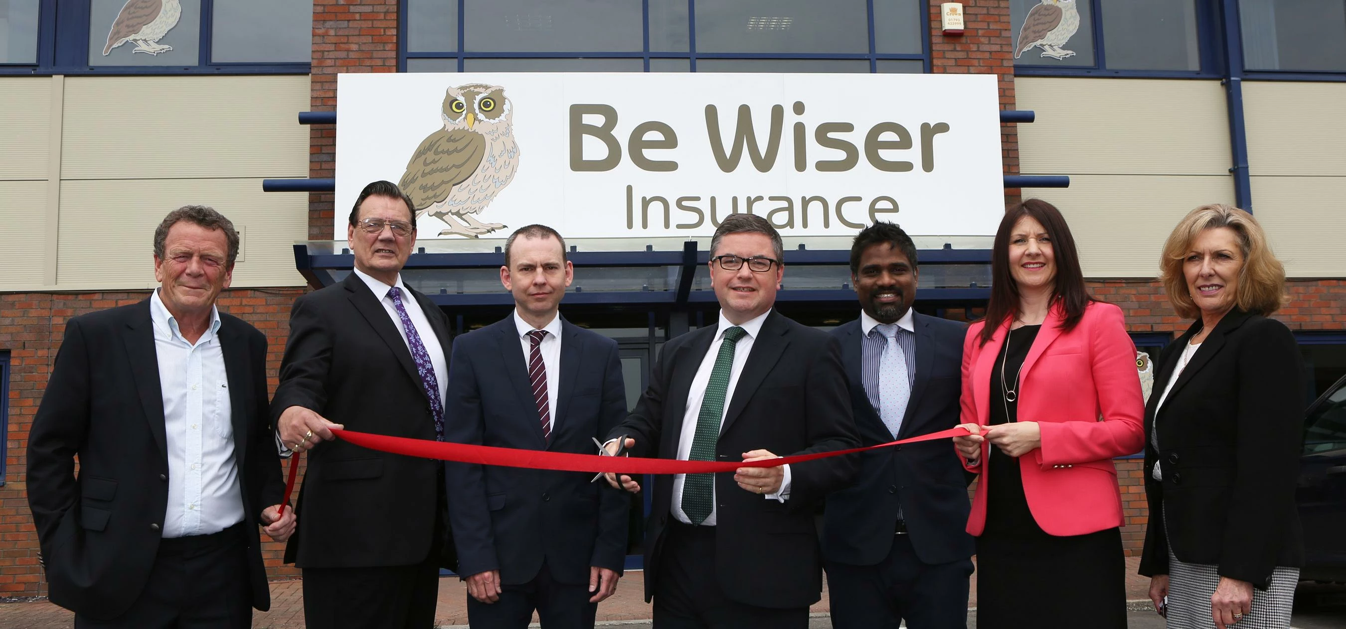 Pictured left to right Be Wiser financial director Andrew Dunkerley, Councillor Garry Perkins, Rober