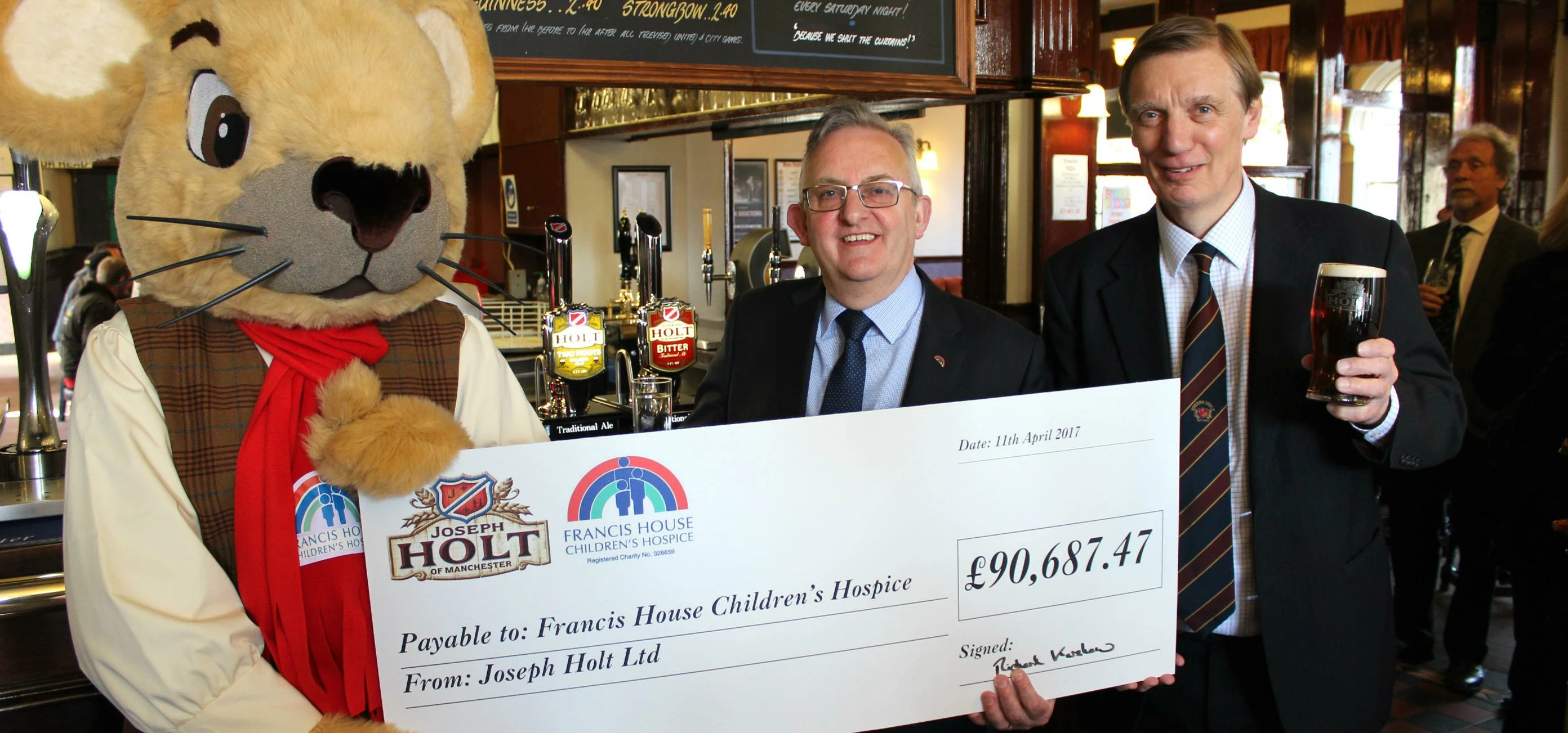 Mascot Francis Mouse, David Ireland and Richard Kershaw chief executives of Francis House Children's
