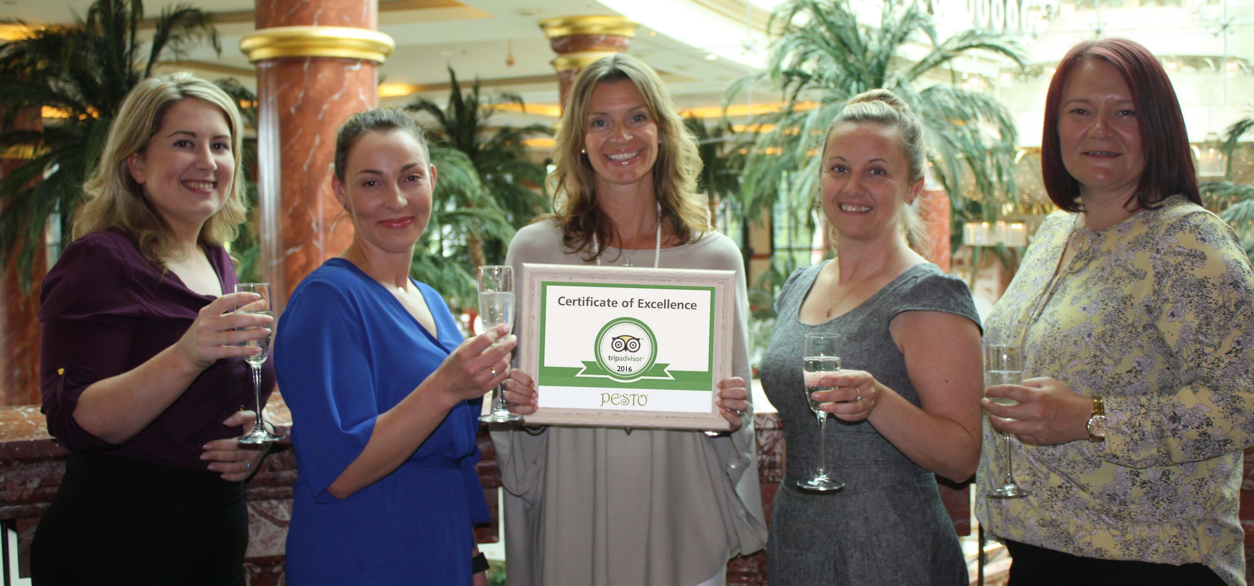 Pesto Co-owner Sara Edwards (centre) toasts the restaurant group's multi-award winning success with