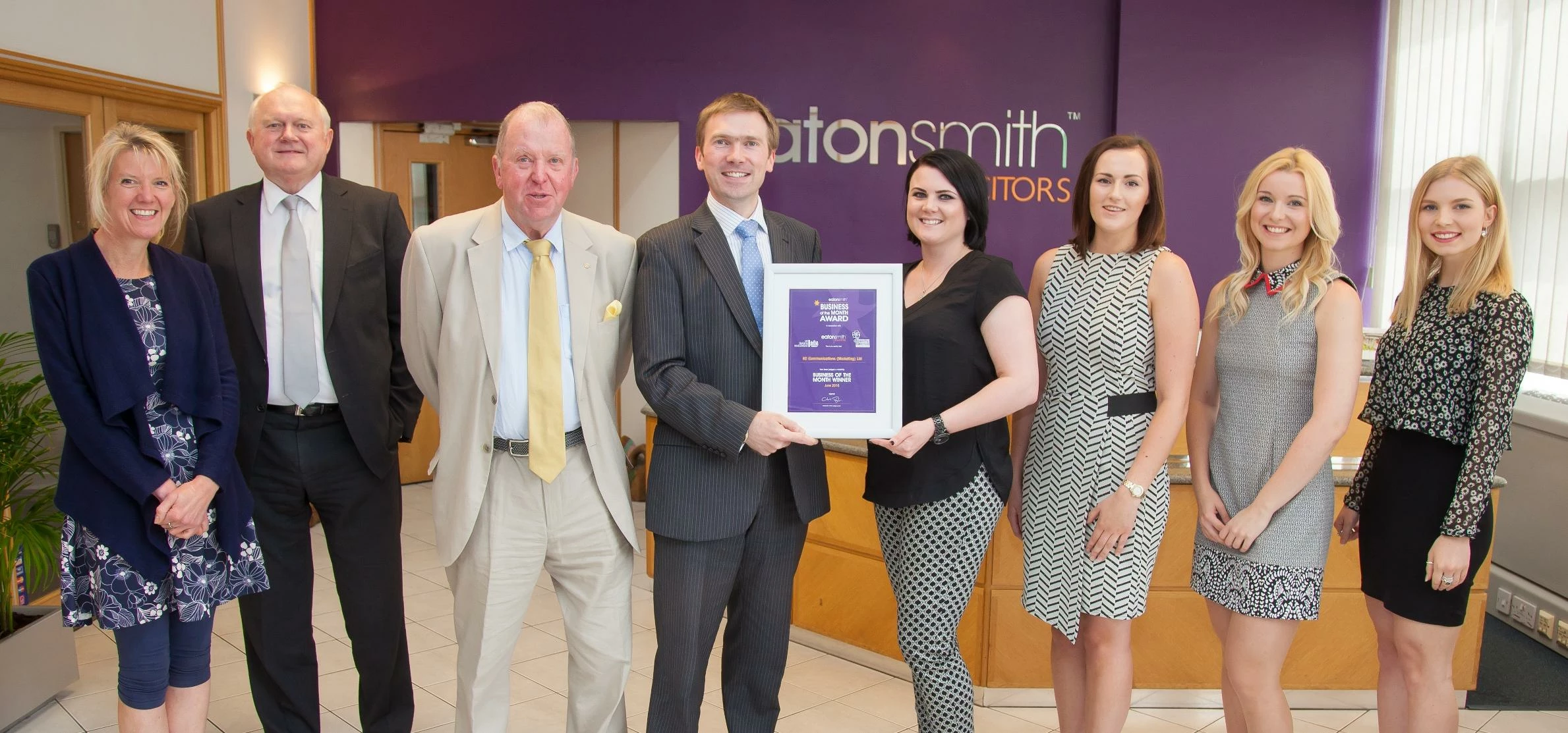 KC Communications Founder & Managing Director being presented with the Eaton Smith Business of the M