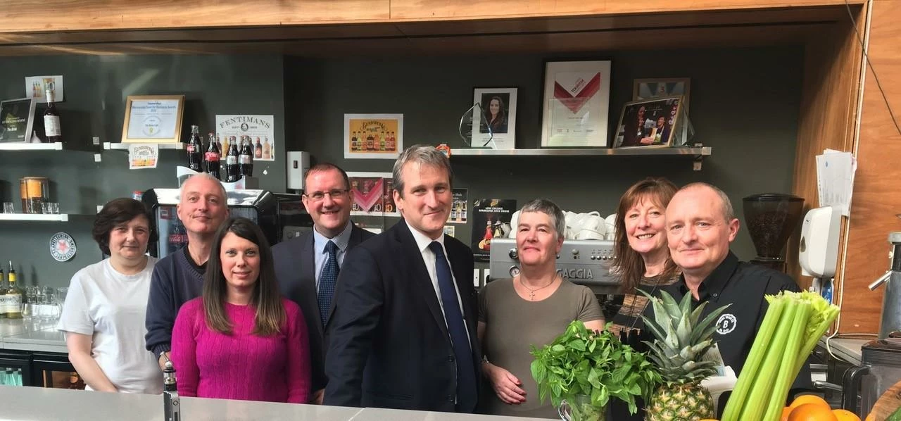 Staff at The Brink, Liverpool with Employment Minister Damian Hinds MP