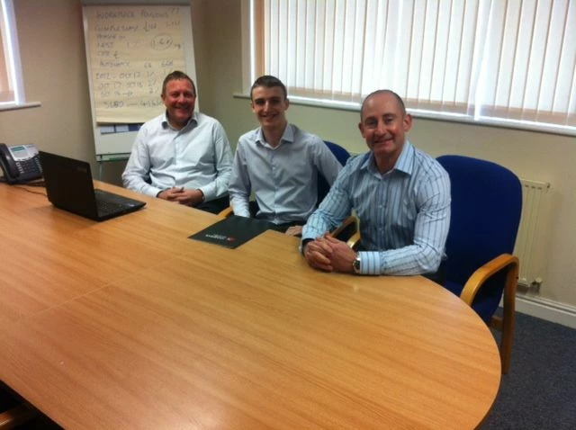 Josh Gannon (centre) with co-founders and directors of Guardian I.B. Limited, Adrian Mead (R) and St