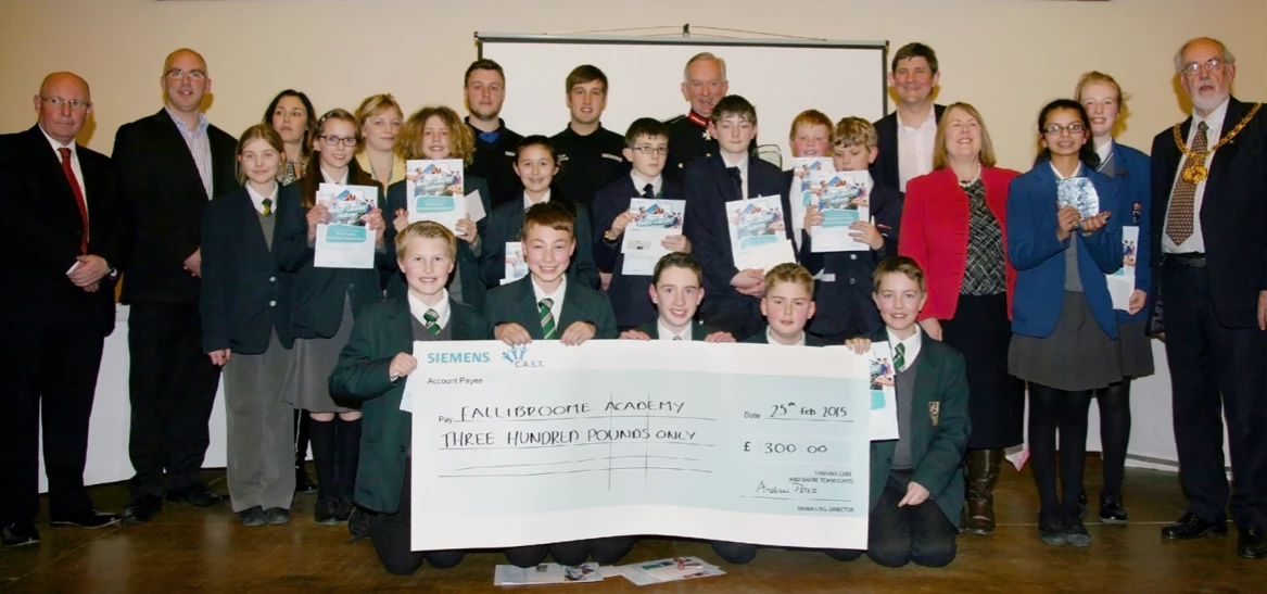 The winning teams with judges and presenters.