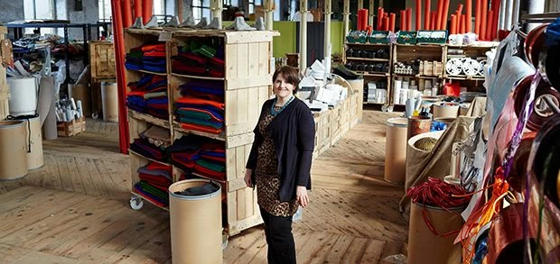 Louise Lucas in Scrap Creative's new premises at Sunny Bank Mills.