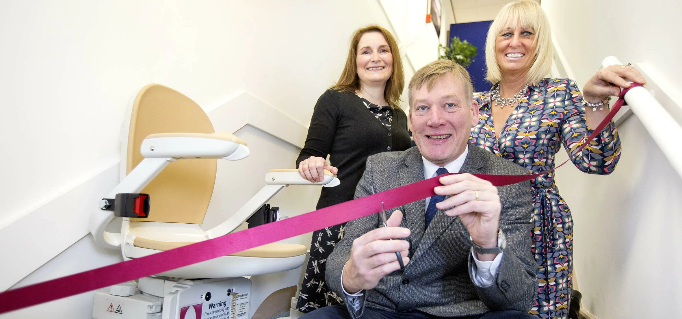 Kris Hopkins MP unveils donation from Acorn Stairlifts 