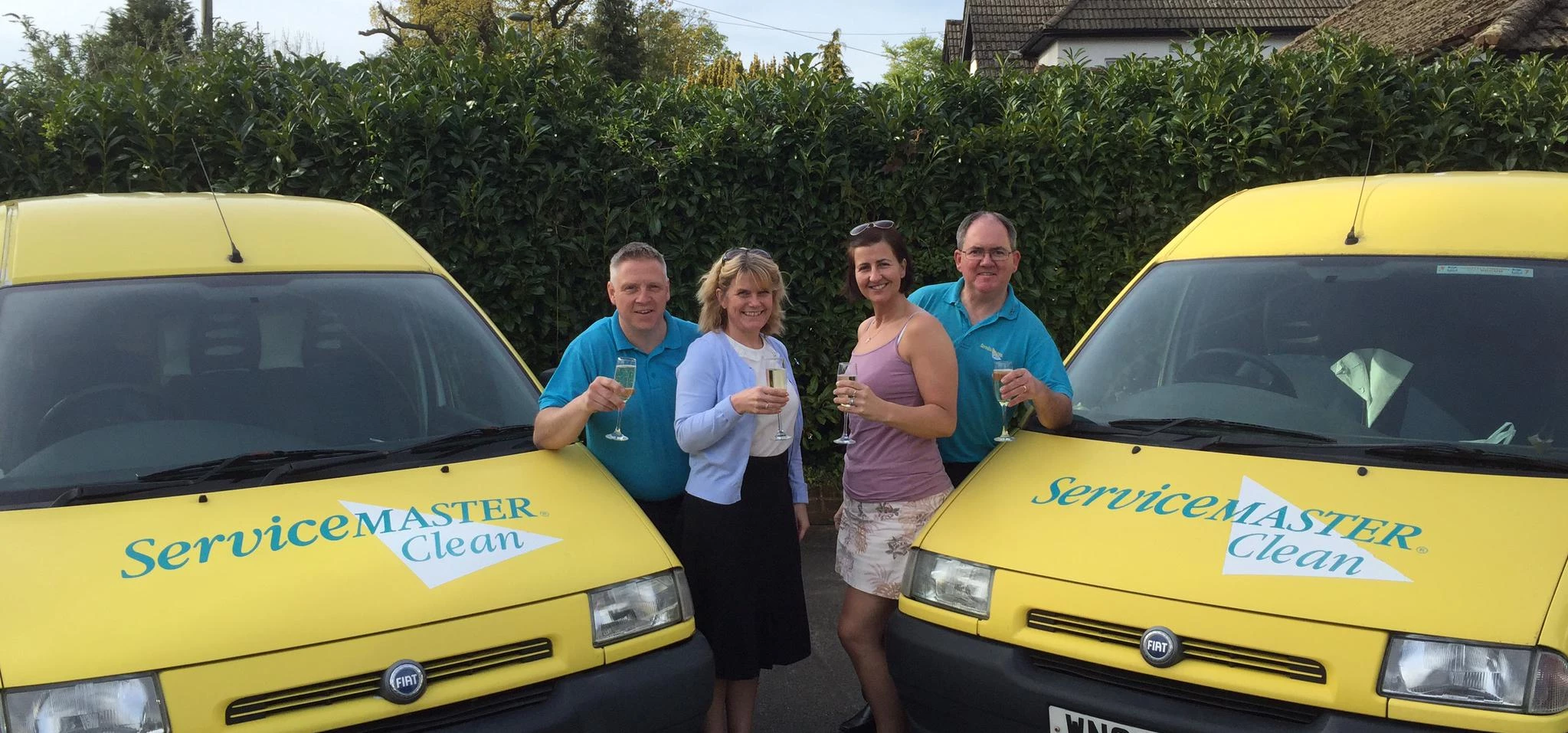 Celebrations! (L-R) Darren and Alison Perry & Sue and Andrew Ashenden, all ServiceMaster Clean Redhi