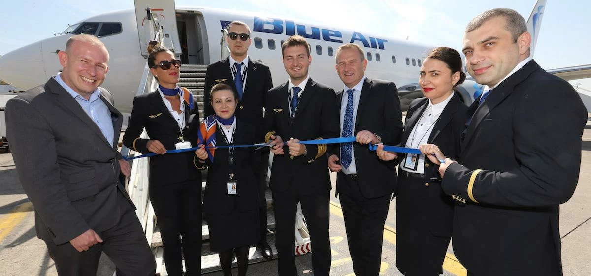 LJLA CEO Andrew Cornish (left), and Paul Winfield (third from right) with Blue Air Captain Popa Rare