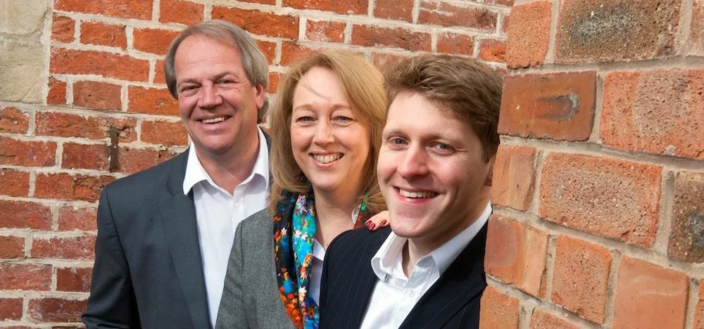 L-R: Barry and Linda Price with Swimtime's new owner, Theo Millward