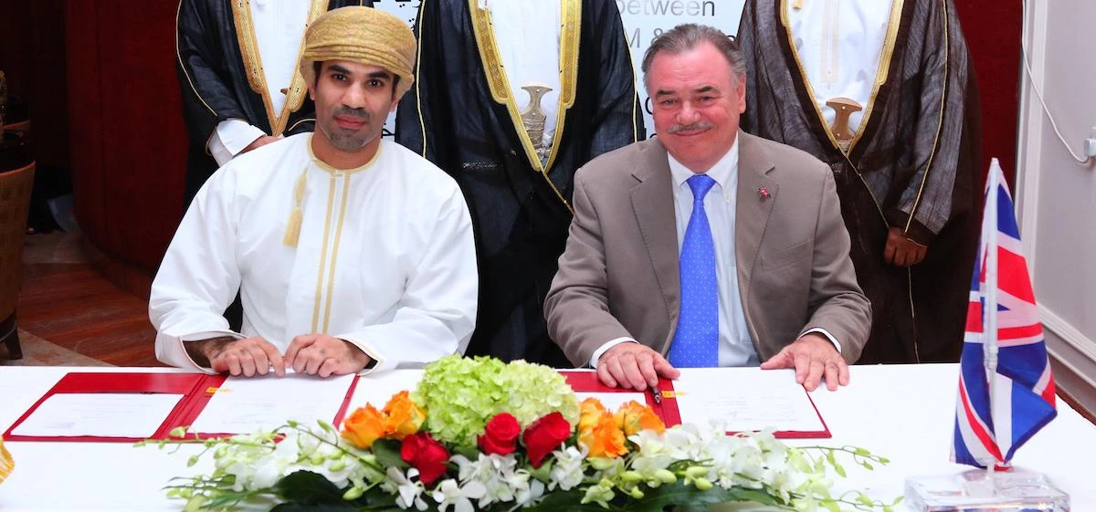ICEM CEO Affan K. Al Akhzam (seated left) signs the contract with UCLan's David Taylor