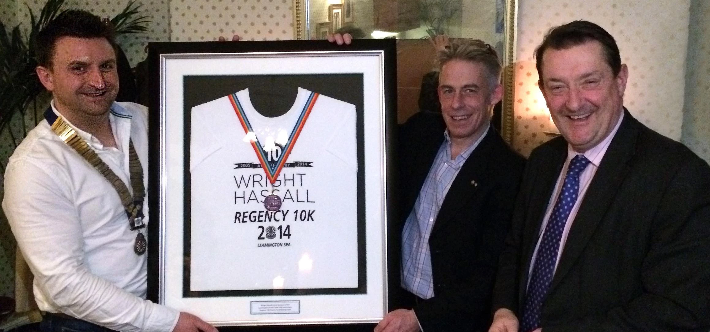 Andy Parish, chair of Leamington and District Round Table, and long-time member Nick Herd present th