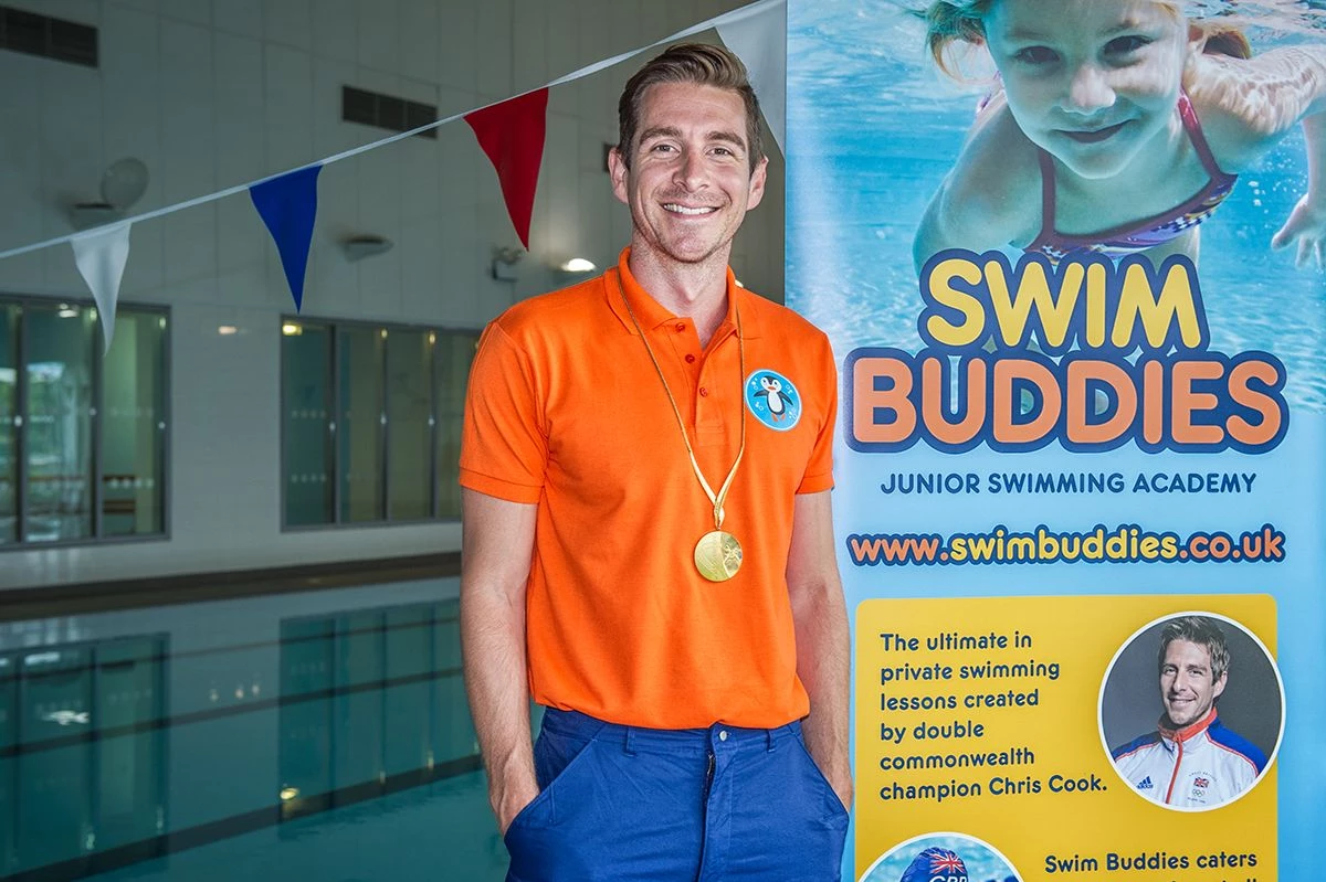 Swim buddies press shot