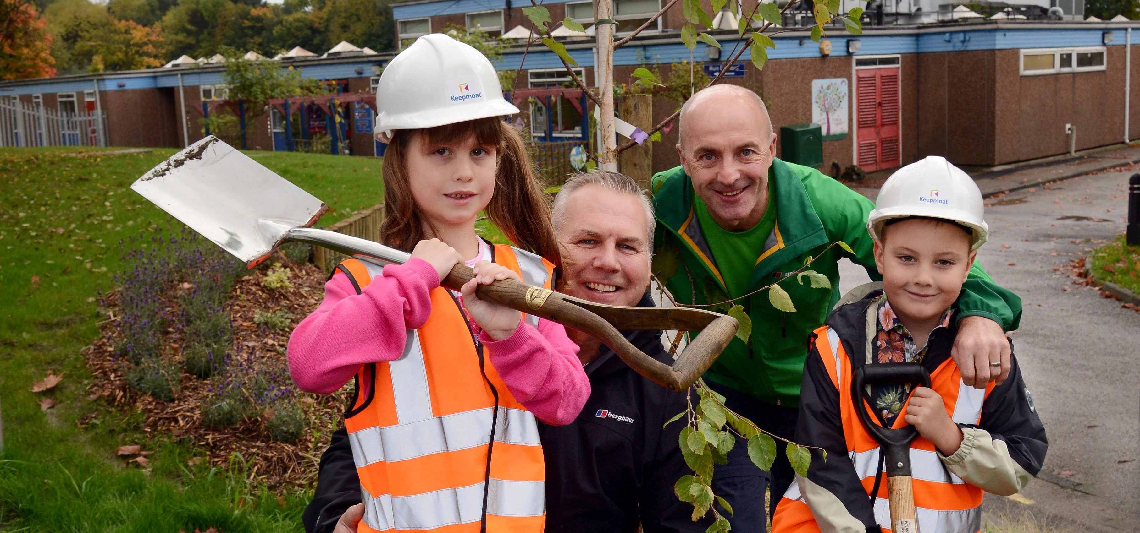 Planting the new tree are (l-r) Lucy and Peter Bell, Gary and Scott Parnaby.