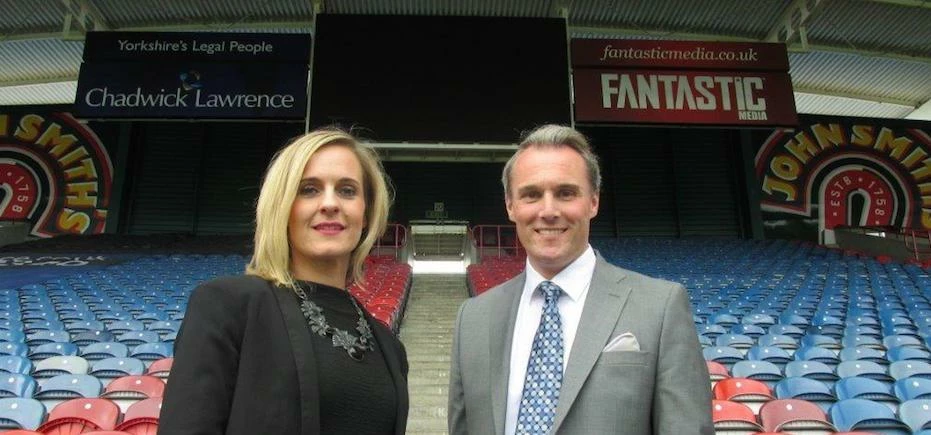 Sarah Callender, managing director at Bdaily, and John Williams, Huddersfield Town's commercial mana