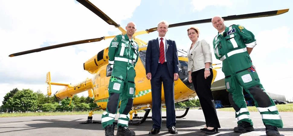 HIGH FLYERS: Pictured (L to R) in front of Lincolnshire and Nottinghamshire Air Ambulance Charitable