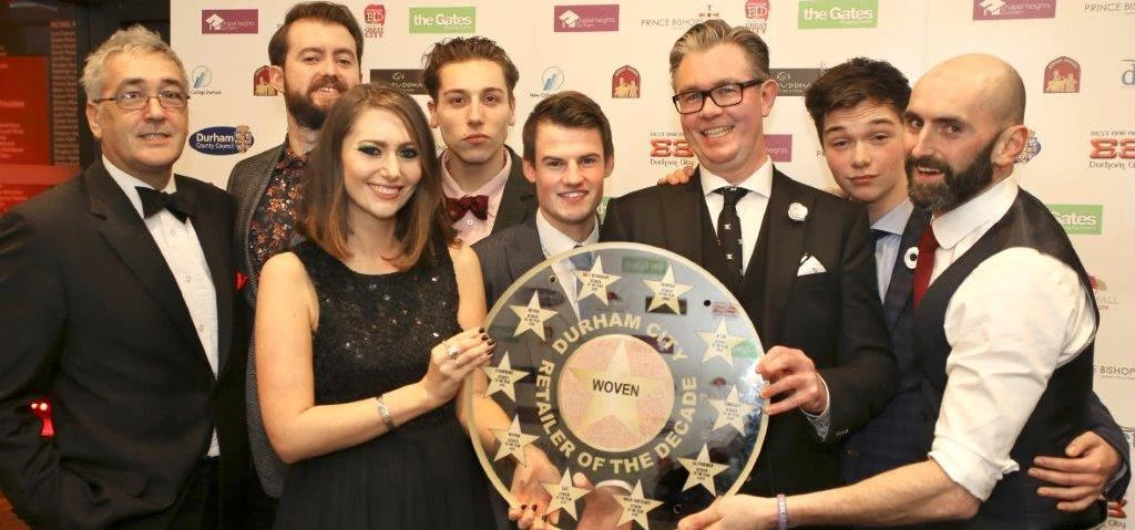 The Woven team with the Retailer of the Year Award