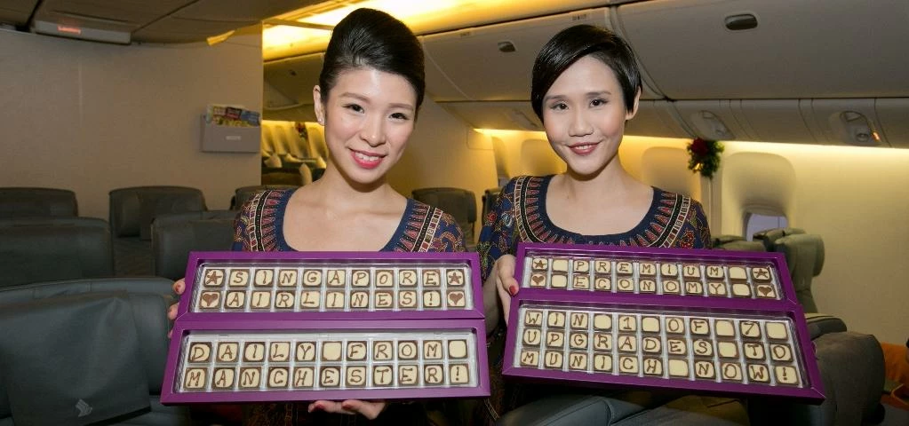 Two Singapore Airlines cabin crew members