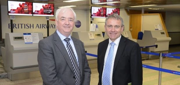 John Parkin, Chief Executive (left) welcomes Robert Goodwill (right) to Leeds Bradford International