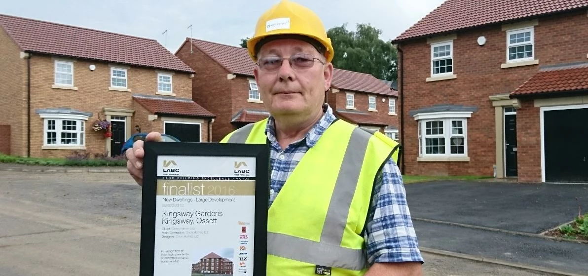 John Butterwood with Orion Homes' LABC Award