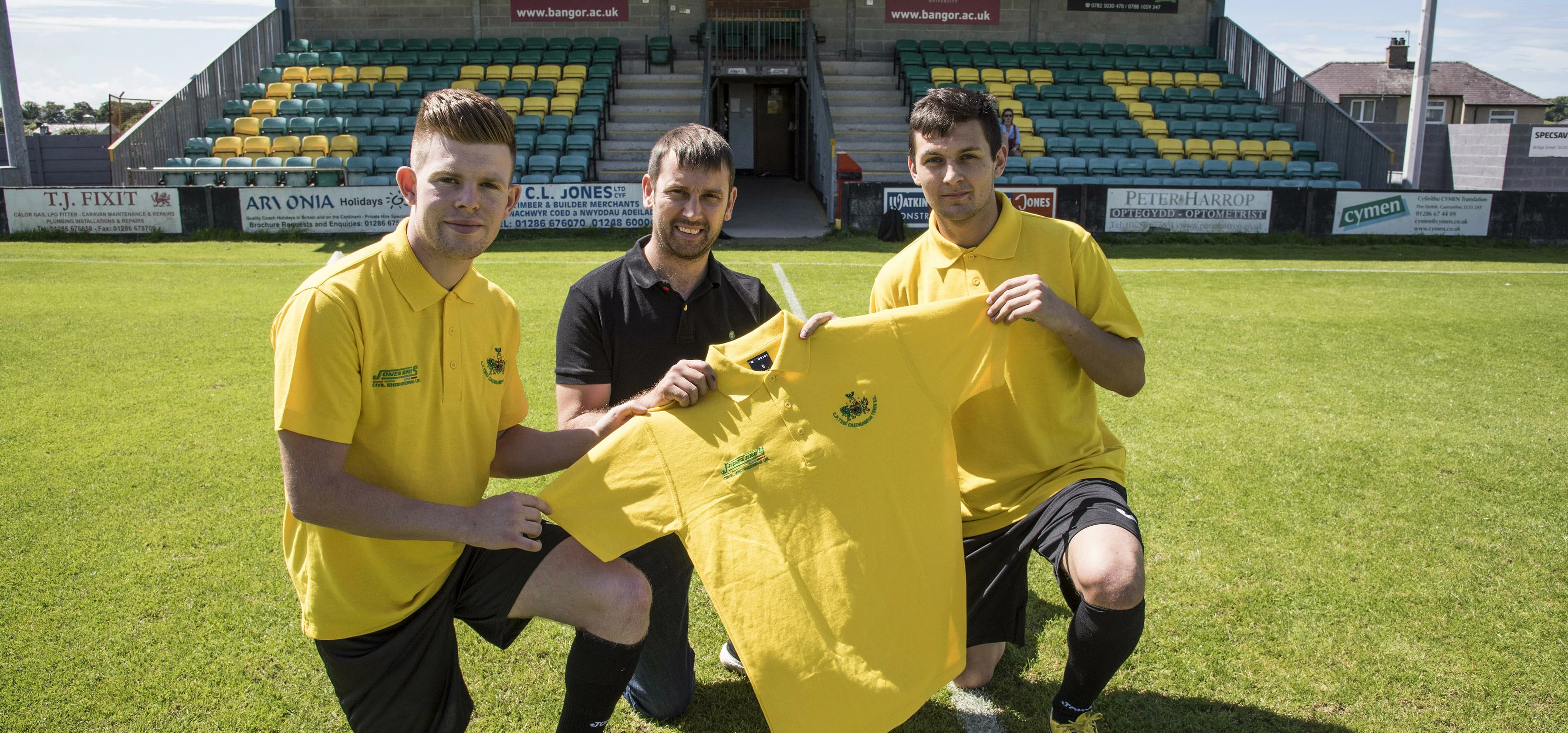 Jones Bros' regional manager Hefin LLoyd-Davies with the new Jones Bros sponsored shirts.