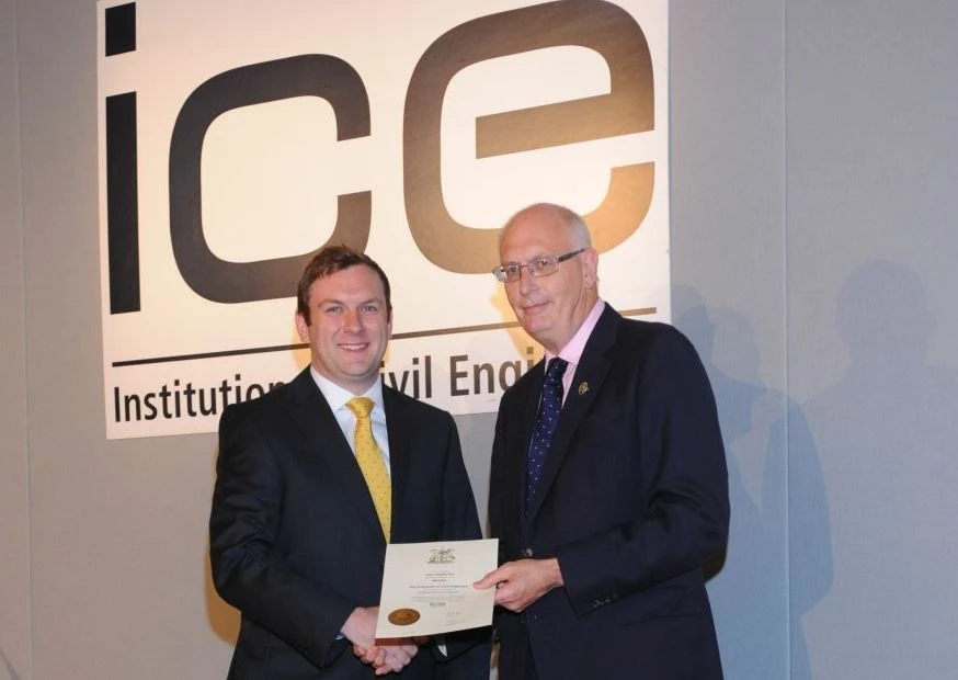 Charlie Bell (left) receives his membership certification from ICE President Professor Barry Clarke