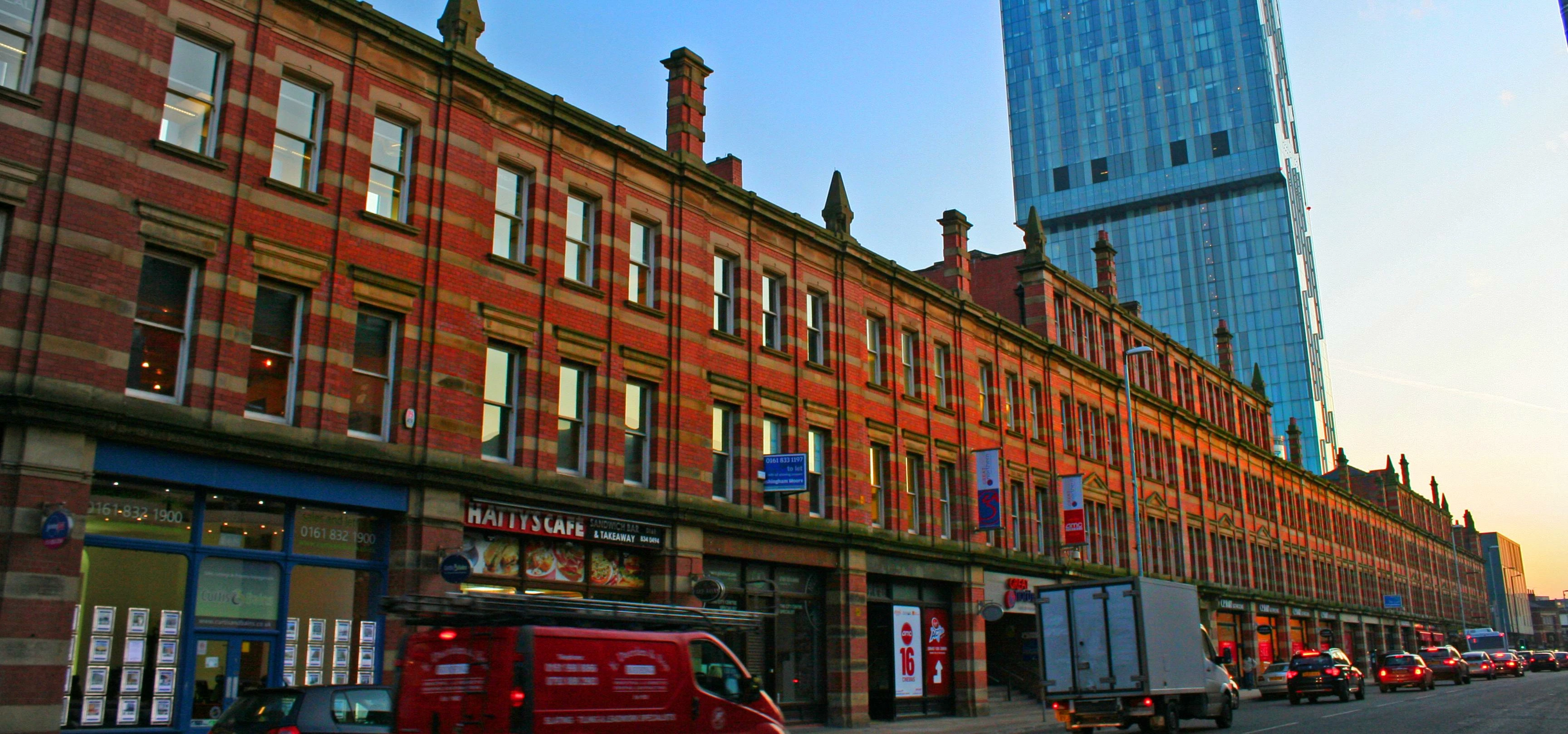 Deansgate - Long, old, red-brick horizontal  v  Tall, new, glass vertical