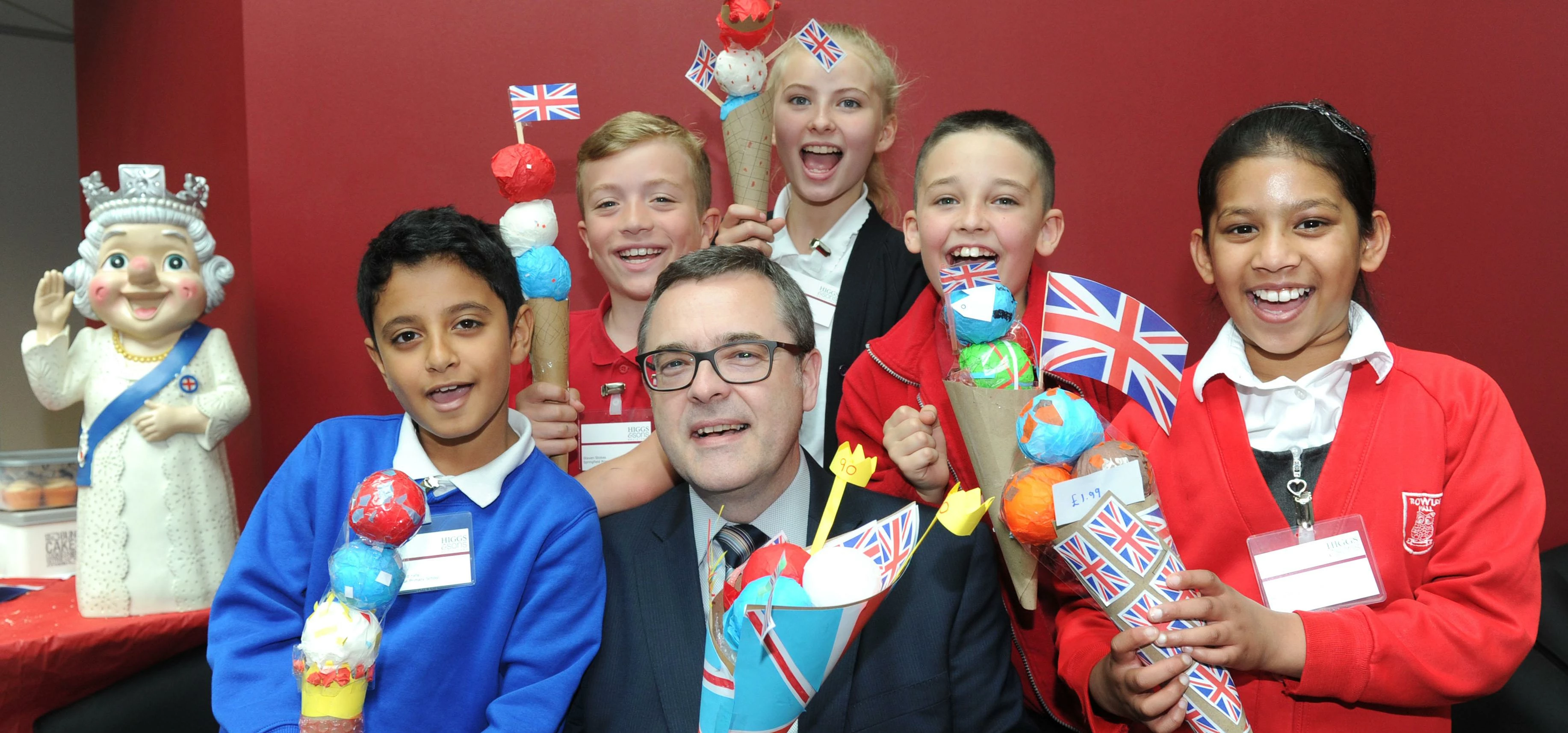 Managing Partner at Higgs & Sons, Paul Hunt, enjoys an 'ice cream' with some of the pupils