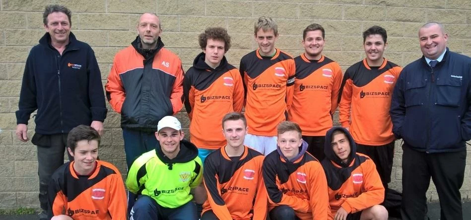 Tom Harrowell (right) and Paul Byrne (left) from Bizspace present the new away kit to Ovenden Phoeni